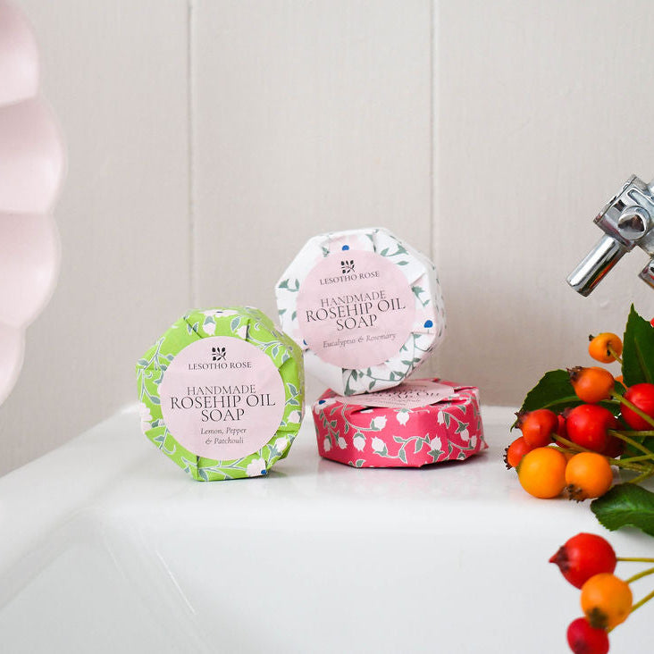 trio of soaps on sink